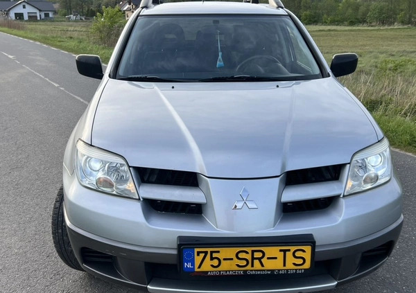 Mitsubishi Outlander cena 16800 przebieg: 220000, rok produkcji 2006 z Biała Piska małe 154